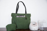 green canvas and leather breast pump bag 