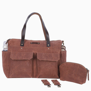 brown waxed canvas diaper tote bag large size. 11 waterproof pockets. water resistant waxed canvas and leather