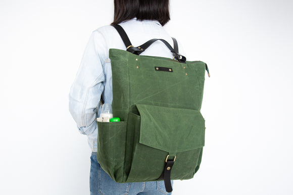 forest green waxed canvas baby diaper backpack