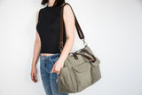 khaki crossbody diaper tote bag in water resistant waxed canvas and leather
