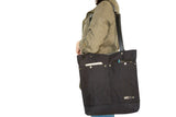 Small convertible laptop backpack purse in black waxed canvas and leather