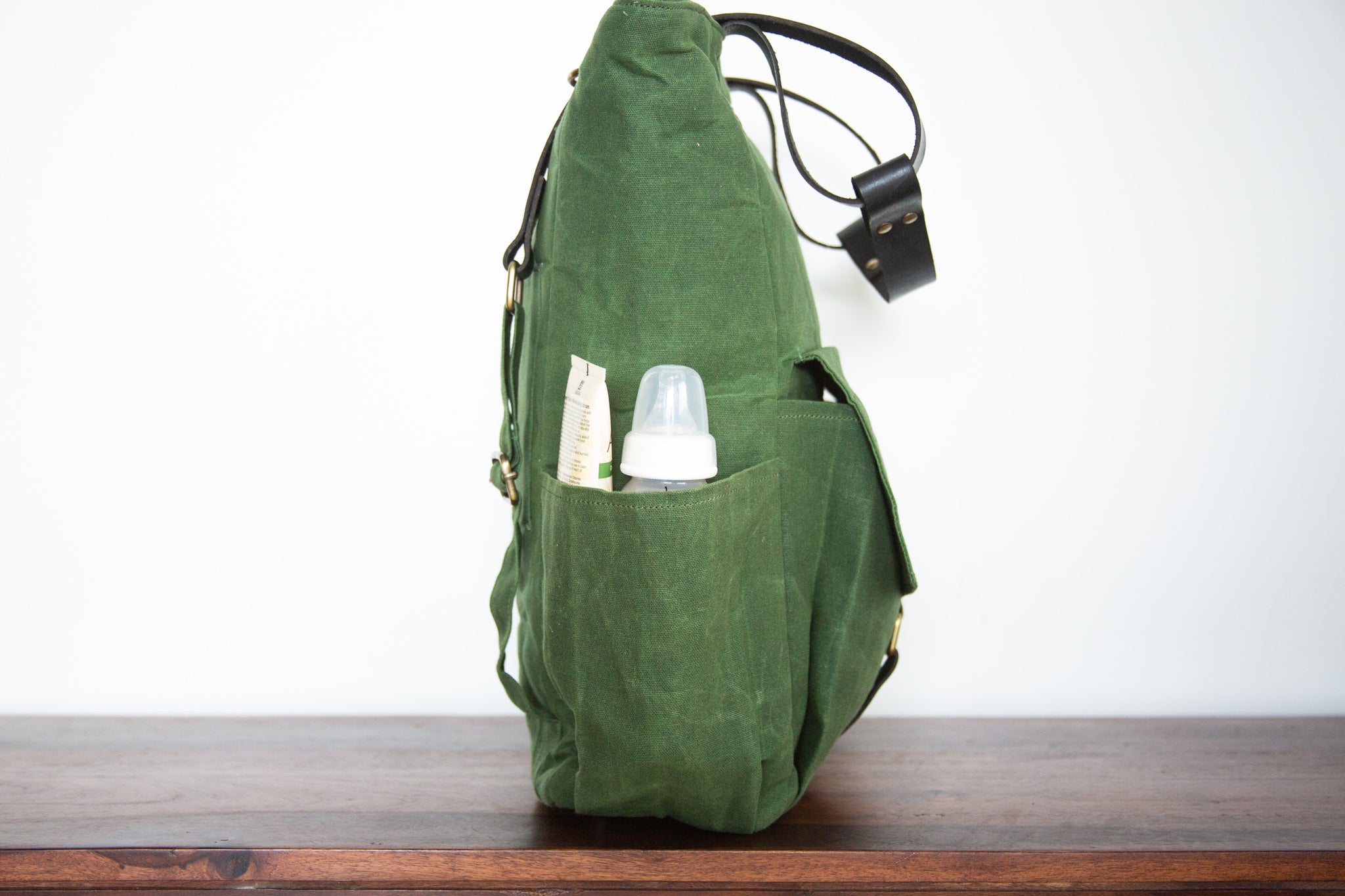 canvas leather diaper backpack Papyrus | Convertible Diaper Backpack in Forest Green | Waxed Canvas & Leather